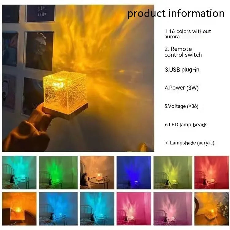 Modern geometric crystal table lamp projecting blue water ripple light pattern on a wall.