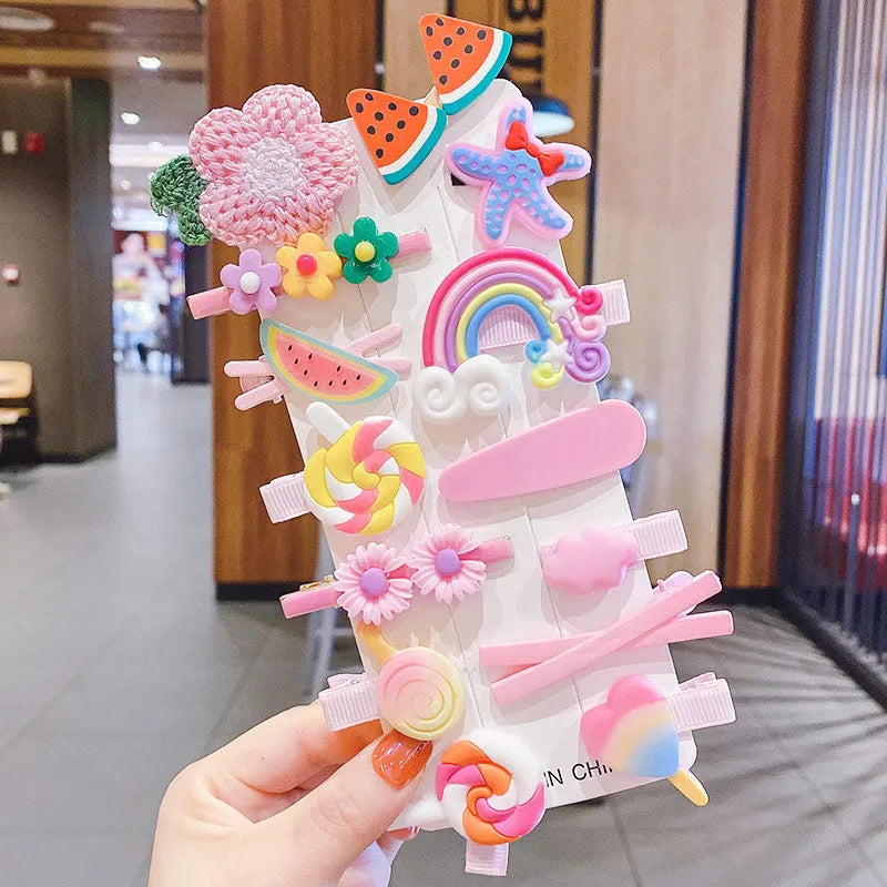 14-piece toddler hair clips set with rainbow barrettes, candy fruit, butterfly, and ice cream patterns on white background
