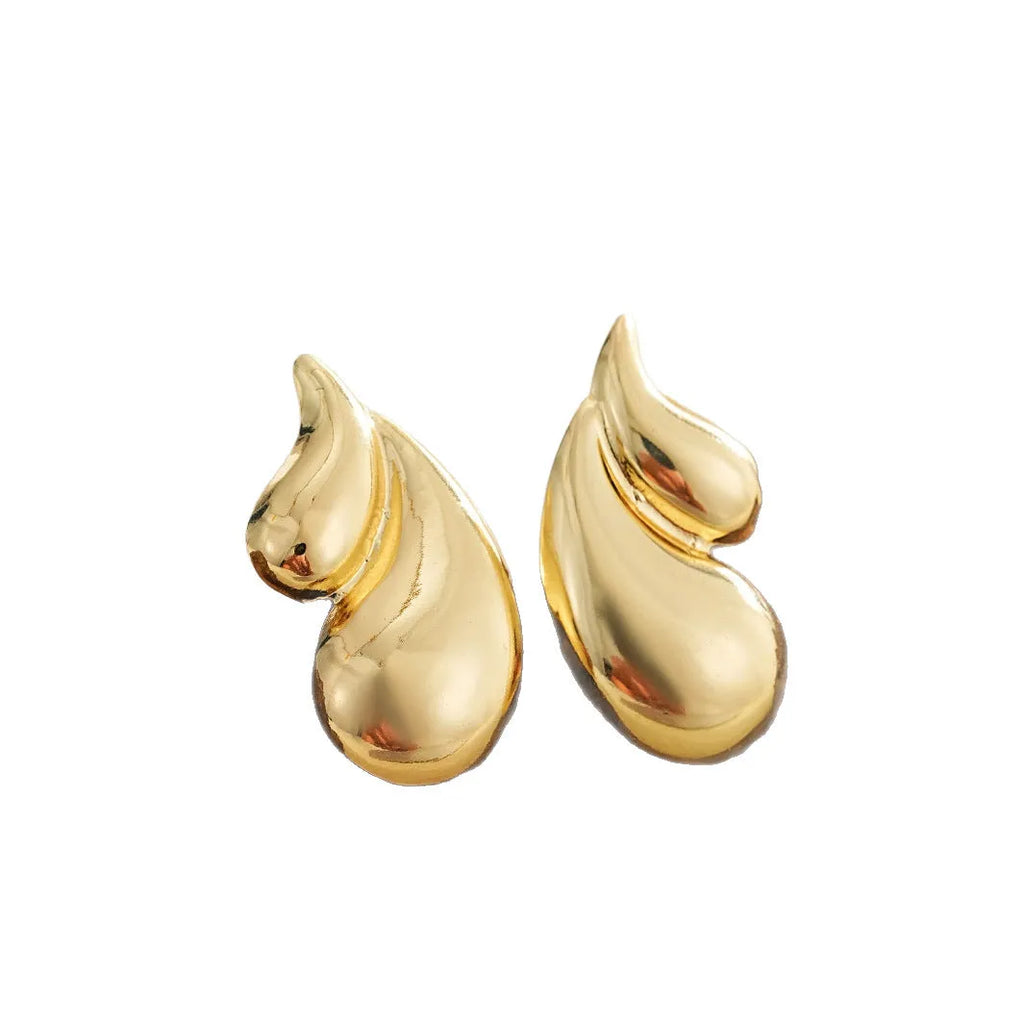 Gold water droplet minimalist dangle drop earrings on a white background