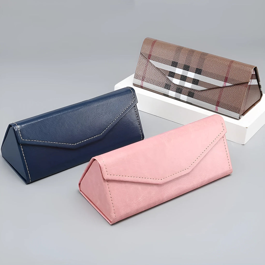 Handmade black PU cowhide triangle folding glasses case showing compact 160x66x16mm size