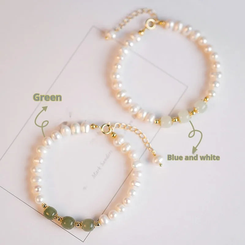 Korean style diamond-shaped freshwater pearl bracelet in Hetian jade colour on a white background.