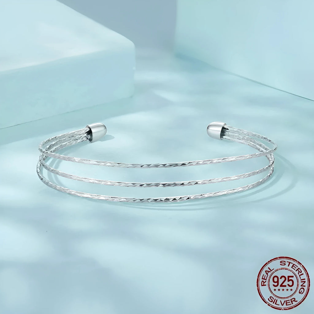 Simple multi-layer 925 sterling silver open-ended bracelet in electroplated colour SCB273 on light background