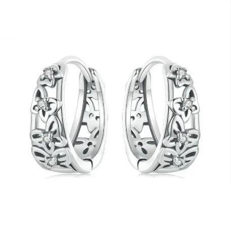Retro hollow butterfly sterling silver 925 earrings with zircon accents, 14mm tall.