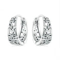 Retro hollow butterfly sterling silver 925 earrings with zircon accents, 14mm tall.