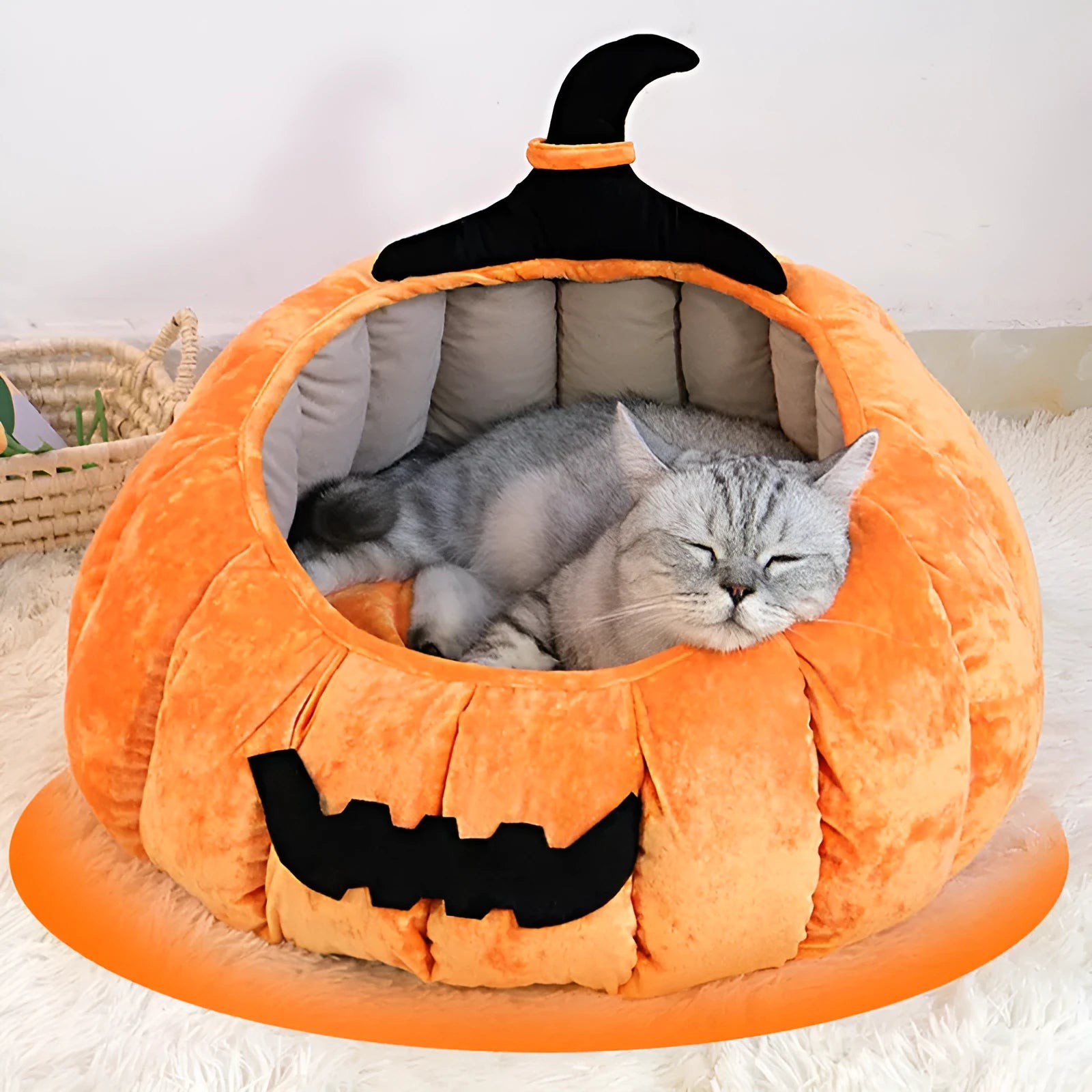 Orange and black pumpkin-shaped cloth cat bed for winter warmth and Halloween pet styling