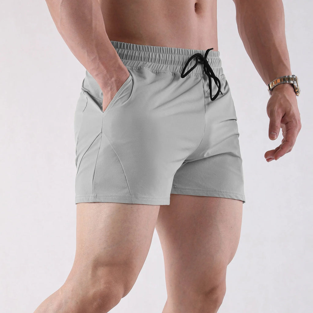 Men's thin grey polyester basketball shorts with elastic waistband for summer sports activities