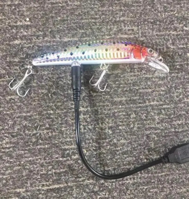 Rechargeable twitching fish lure with USB charging, lights up in the dark