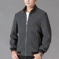 Men's grey sports-style fleece jacket with long sleeves and a side pocket.