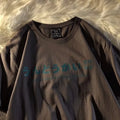 Loose fit cotton t-shirt in black, white or dark grey colours on hanger
