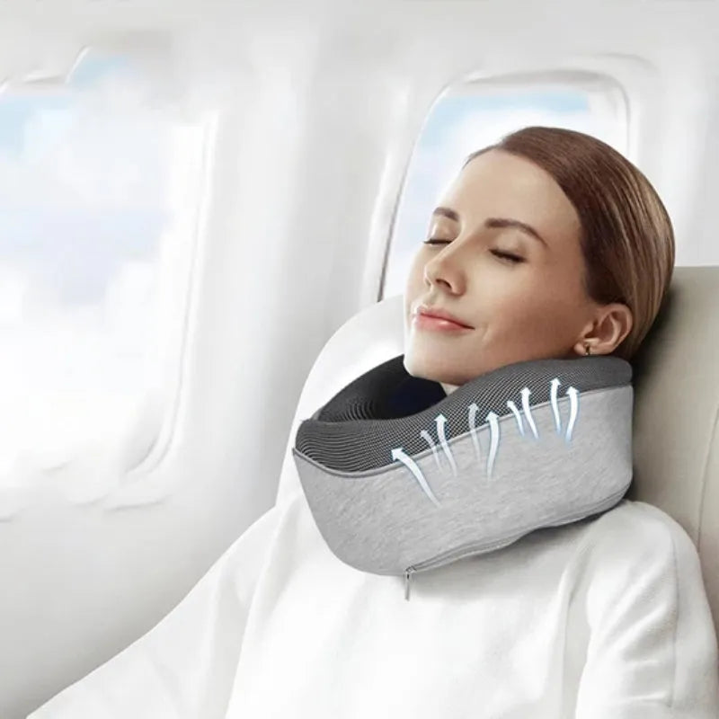 U-shaped travel neck pillow with memory foam filling in navy blue colour with buckle fastening