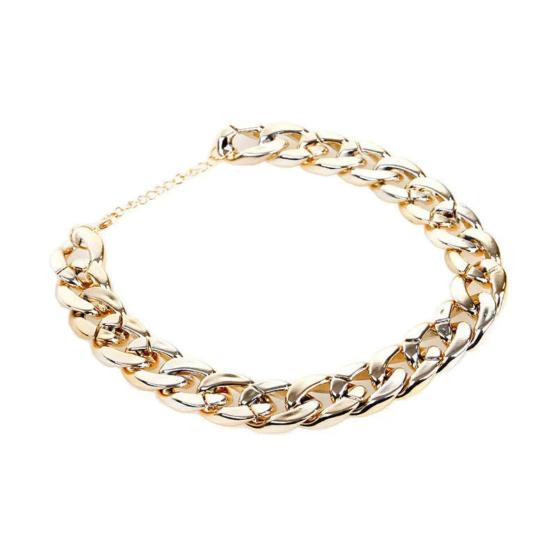 Geometric twisted chain dog collar necklace in gold and white colours on adjustable strap