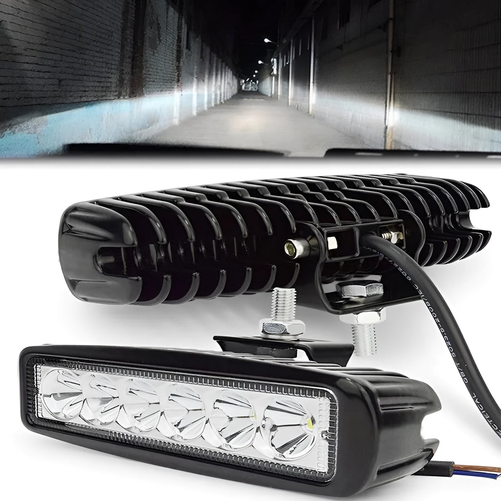 Black die-cast aluminium 18W auxiliary spotlight for car or truck mounting.