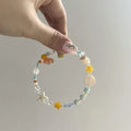 Orange sea theme adjustable alloy bracelet with diamond shape and round decorative elements