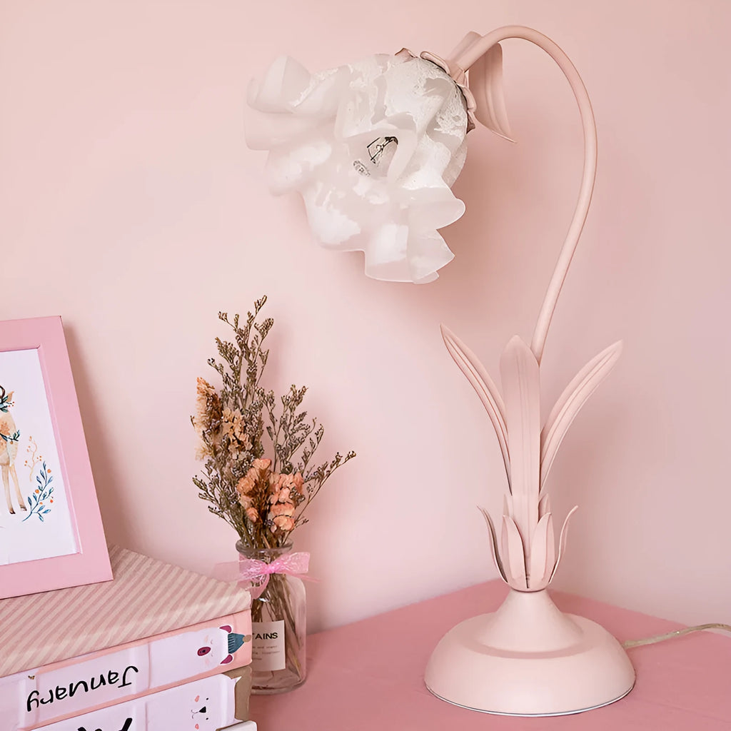 Pink princess room desk lamp with ceramic flowers, glass lampshade, and dimmer switch on a wooden desk