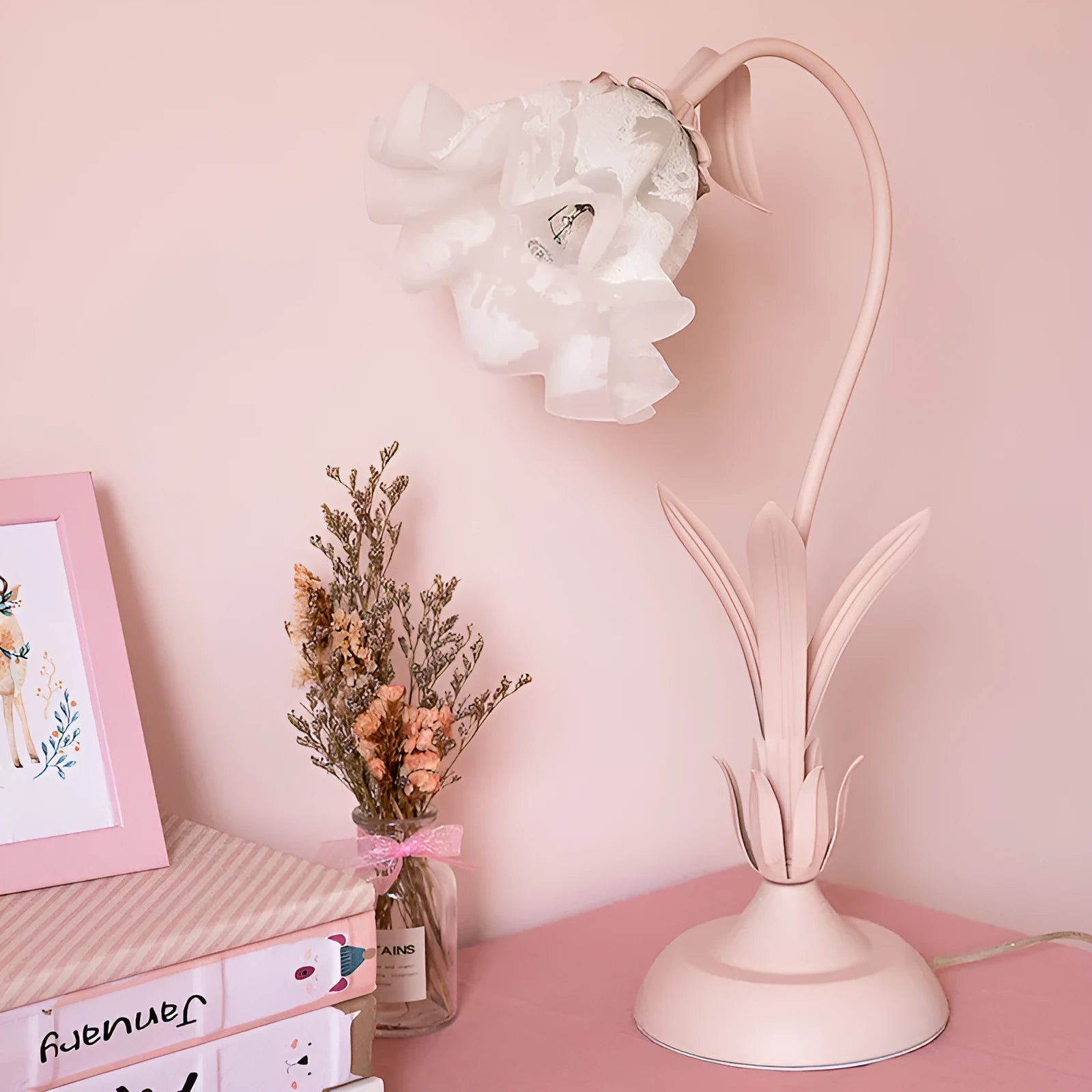 Pink princess room desk lamp with ceramic flowers, glass lampshade, and dimmer switch on a wooden desk