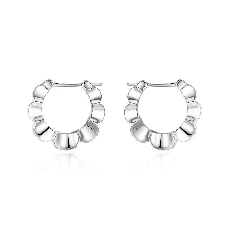 Silver geometric earrings with electroplated finish and circular design elements