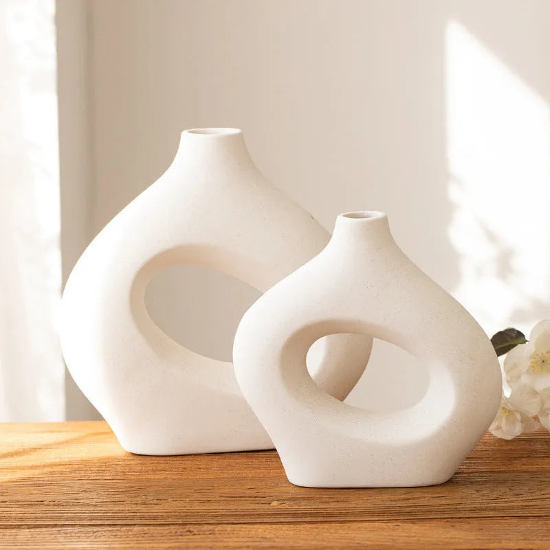 Ceramic soft vase second generation, handmade glazed, white large size on a table as decorative centrepiece