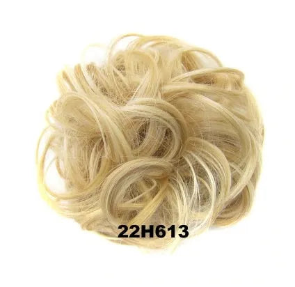 Adjustable hair ring in a natural black shade for creating hair buns and ponytails
