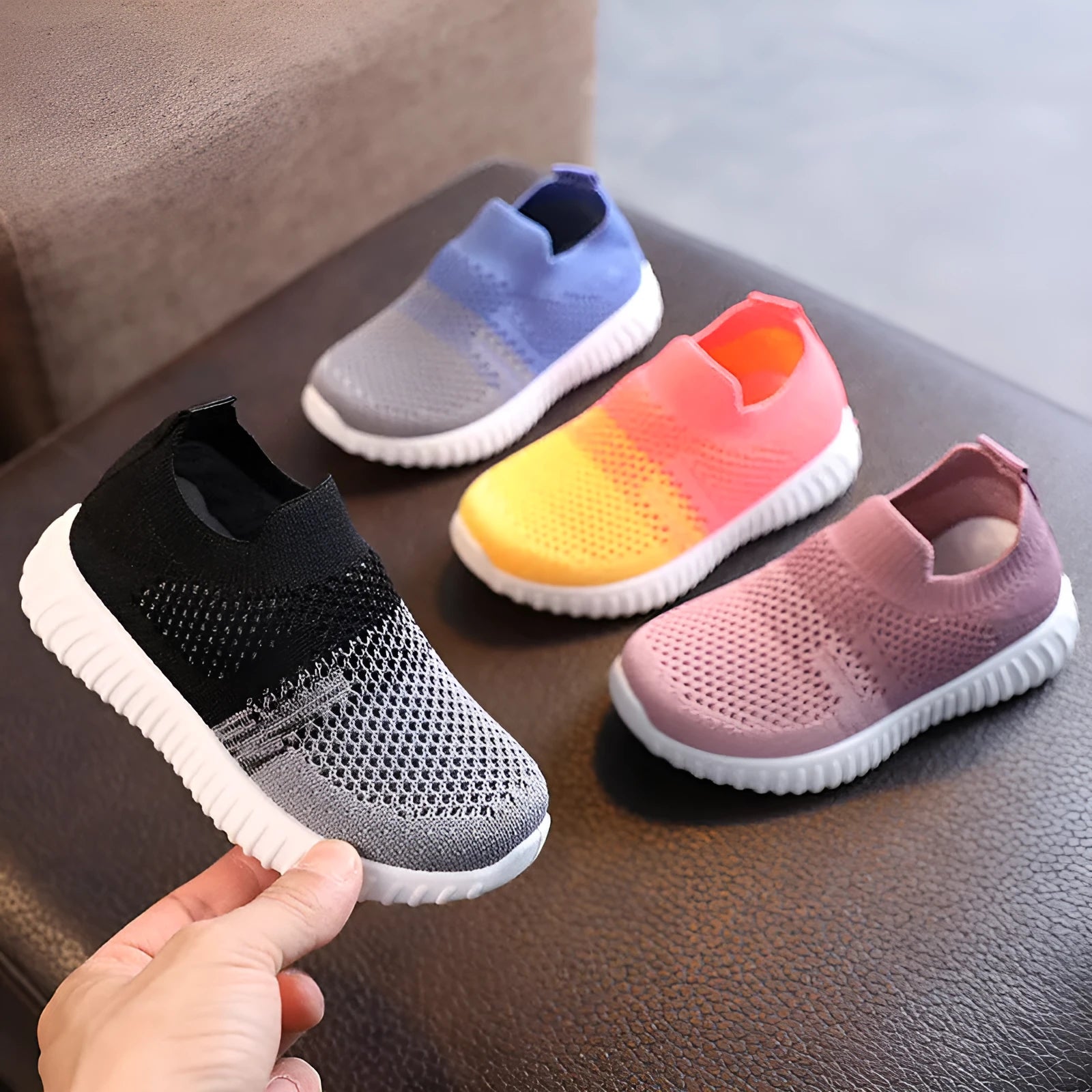 Multicolour knitted fabric toddler sneakers with plastic sole in black, blue, pink, and taro colour options