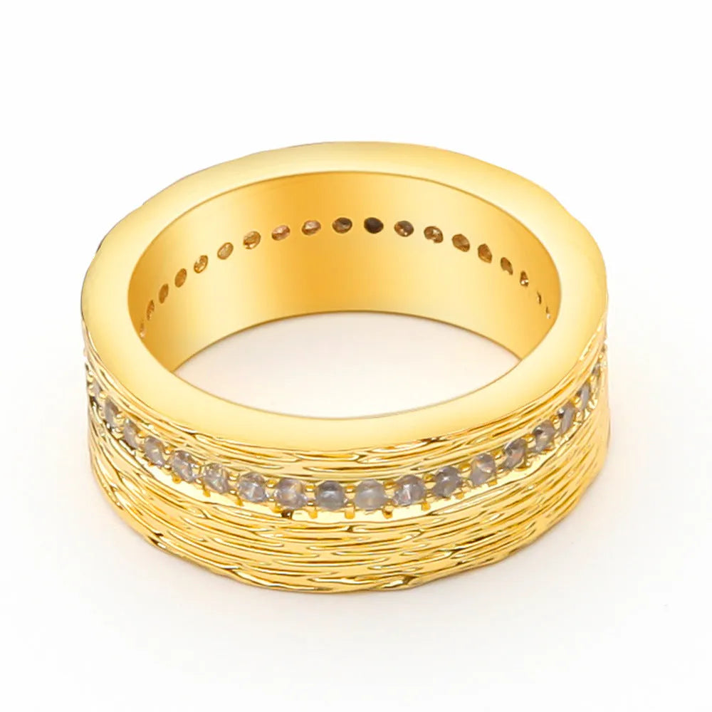 Gold geometric women's ring with zircon stone on copper base, electroplated finish.