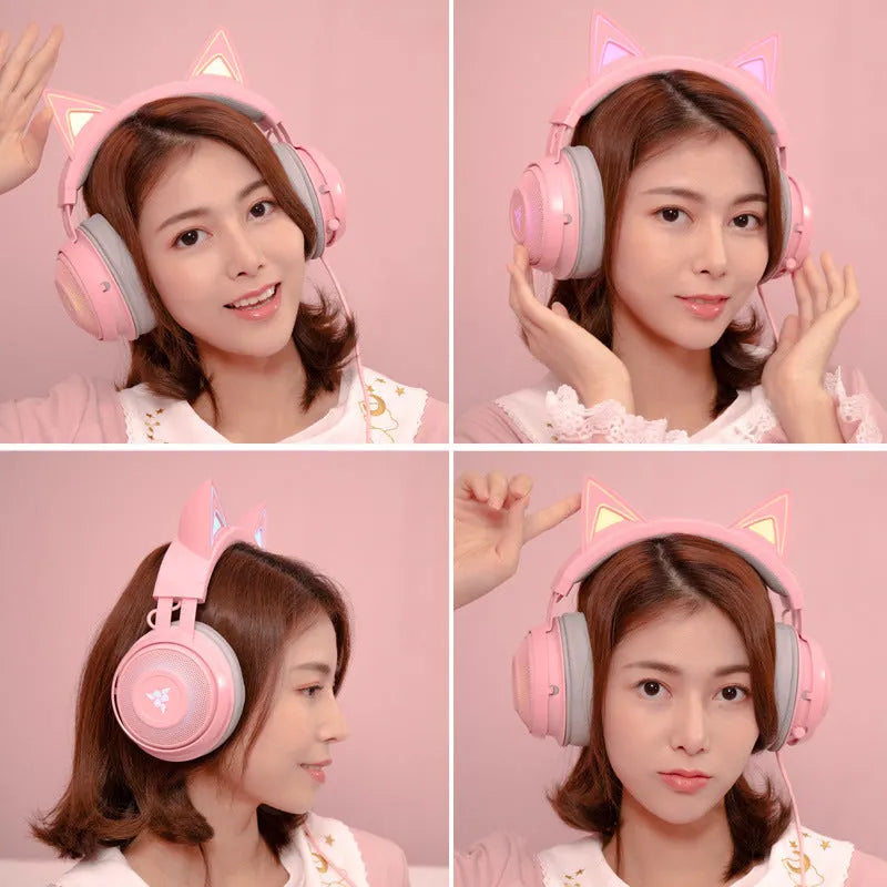 Pink glowing cat earphones with wired USB connection and LED lights on a head-mounted frame