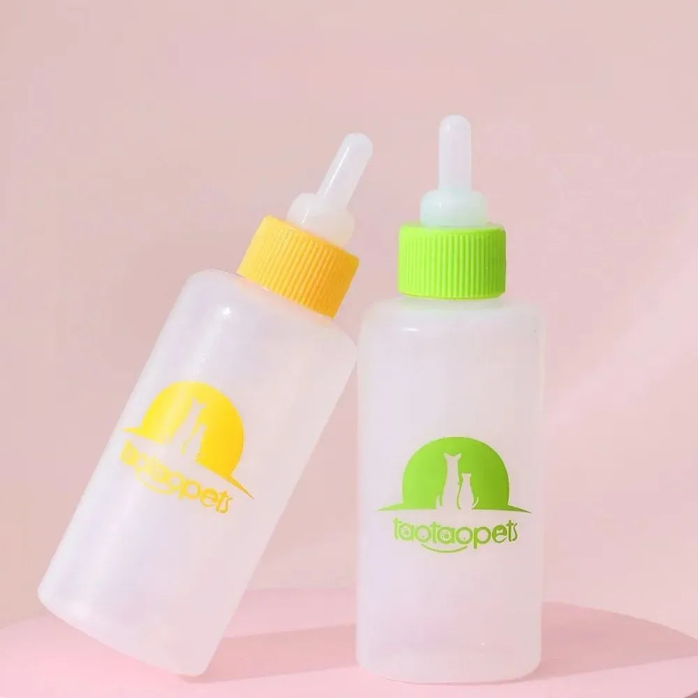 Four pet milk bottles in yellow, pink, blue, and green with a cleaning brush on a white background
