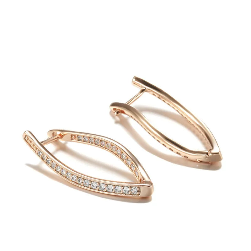 Pair of H0493 copper geometric drop earrings with zircon accents for women on light background