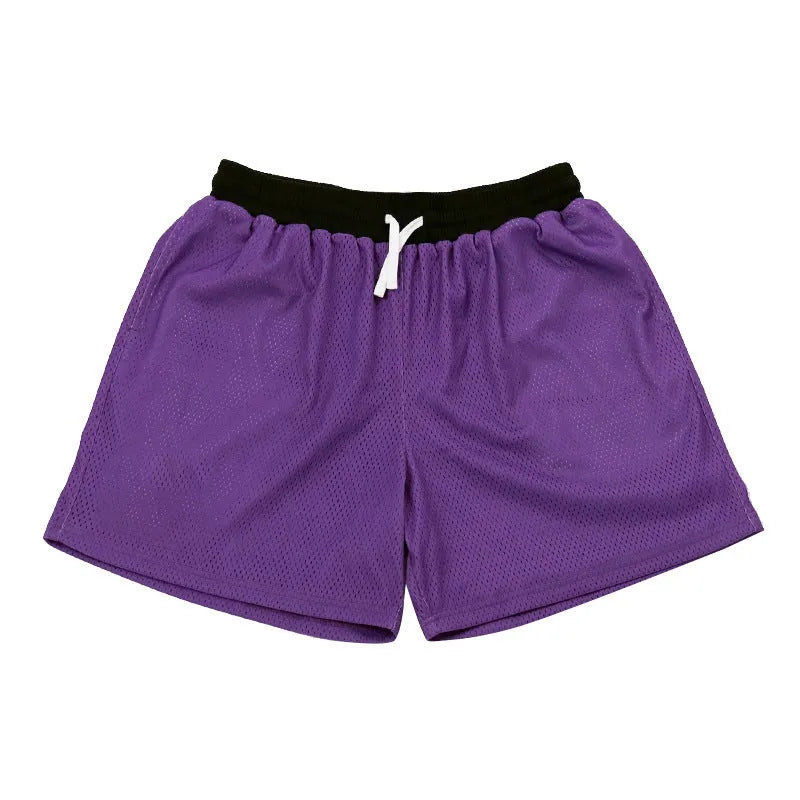 Men's solid-colour mesh quick-drying sports shorts in chemical fibre fabric for running and fitness training.