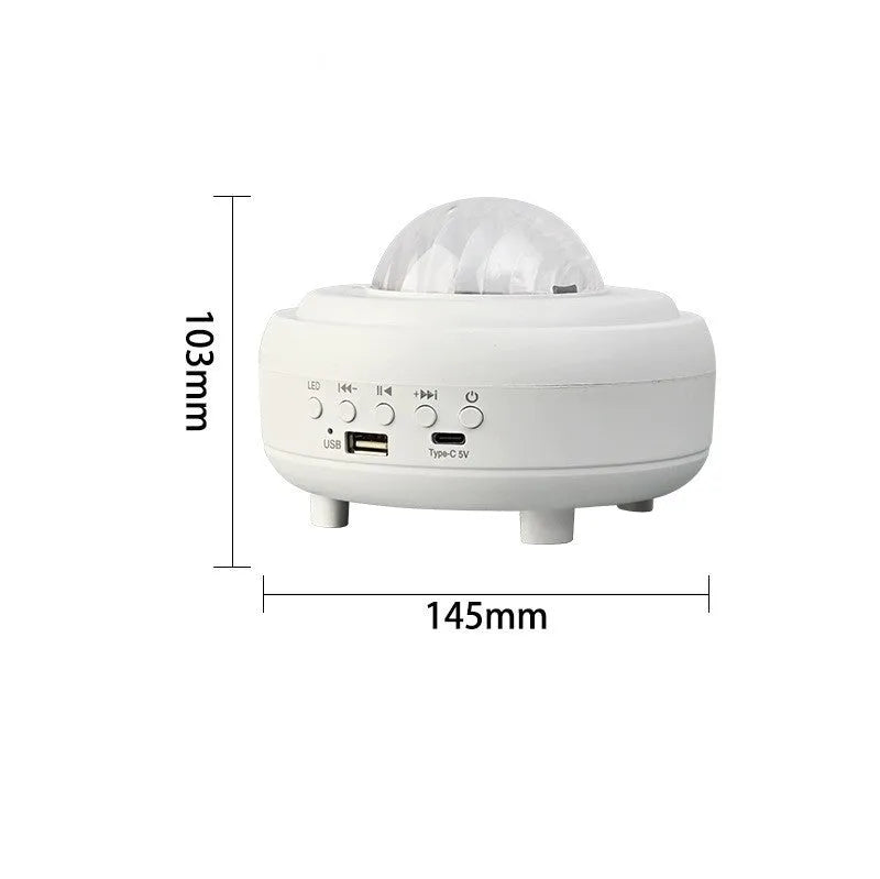 White galaxy star projector night light projecting blue star patterns on wall
