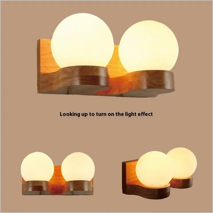 Solid wood spherical wall lamp with glass shade on a living room wall, single head