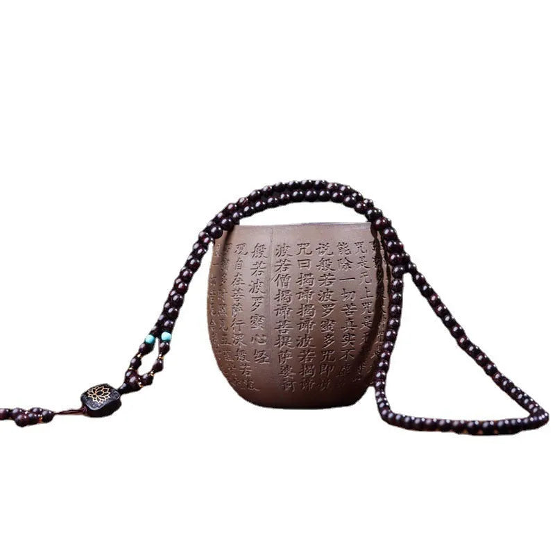 Zambia Rosewood 108-bead bracelet with flat lotus pendant on neutral background