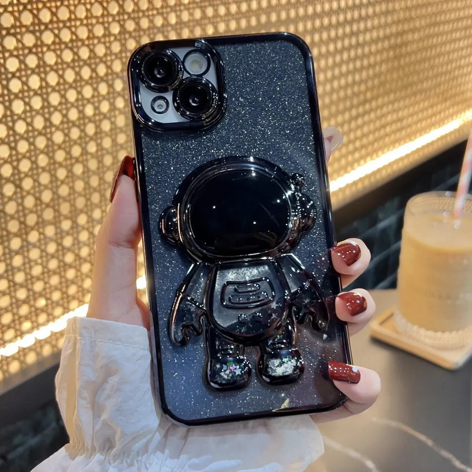 Glitter quicksand iPhone case with electroplated astronaut spaceman design and rhinestone details