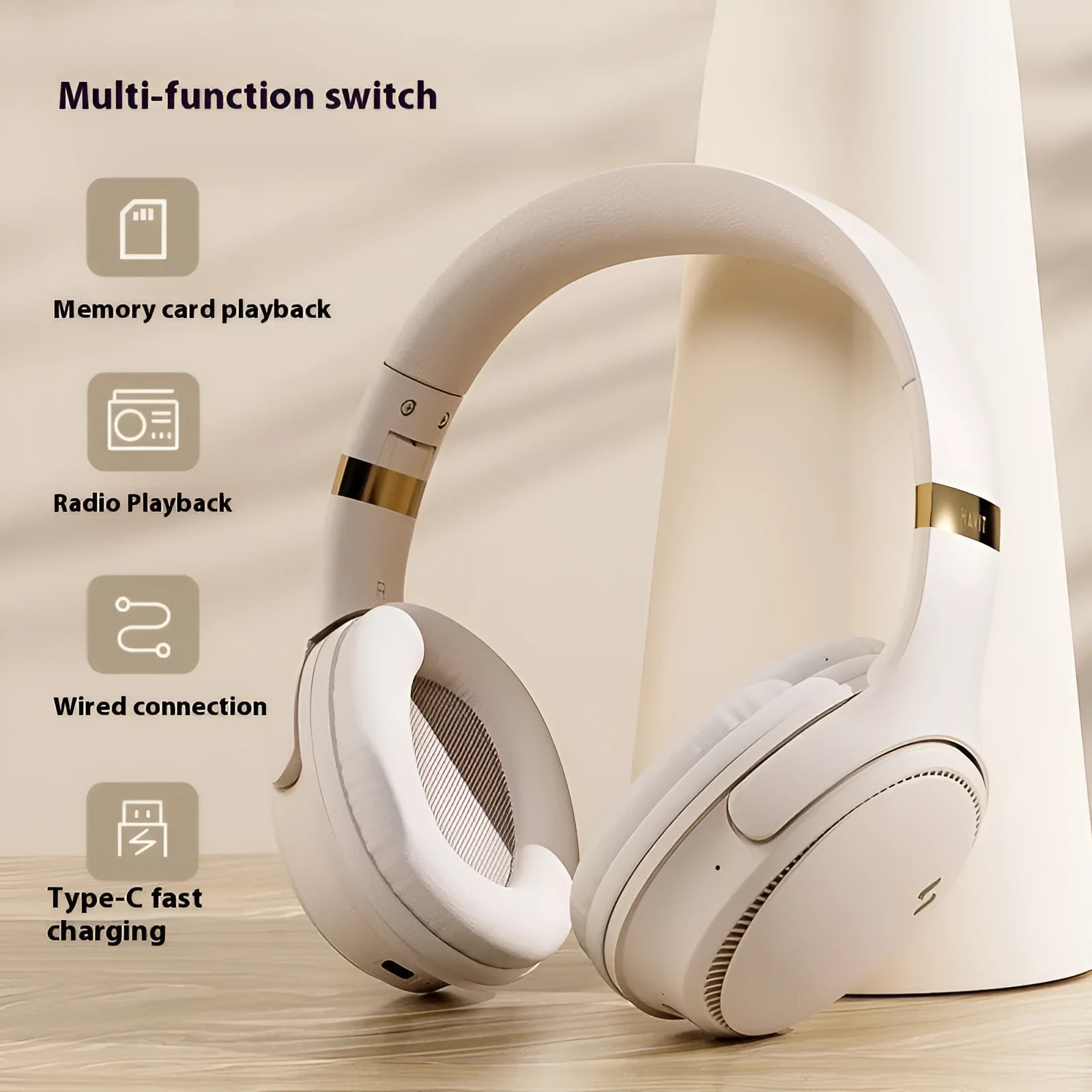 Black and cream wireless Bluetooth gaming headset with over-ear design and noise reduction
