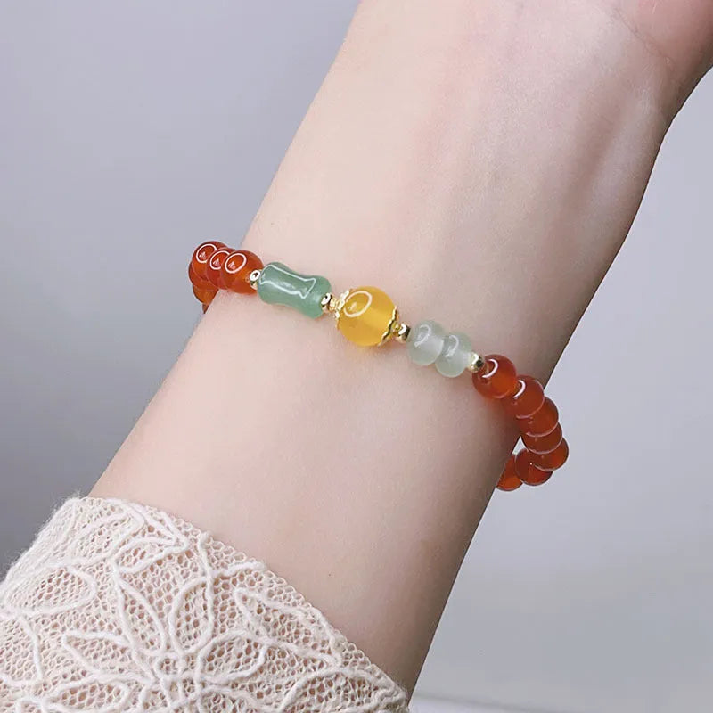 Handmade red agate bracelet with dragon design for women, Chinese style.