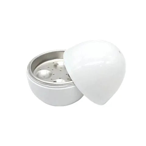 White microwave egg cooker for 4 eggs with adjustable timer knob and vent holes