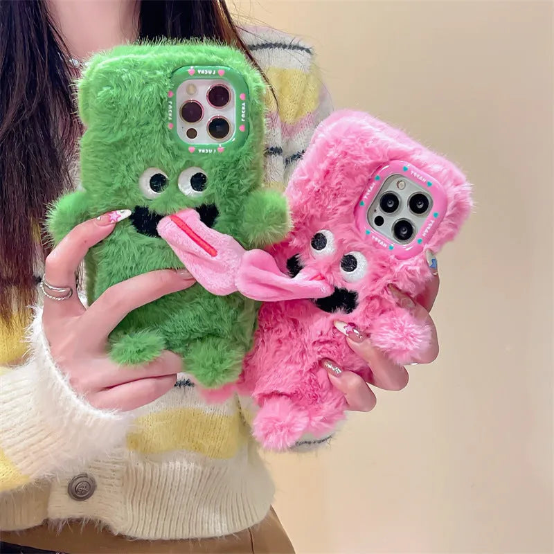 Soft plush phone case with green cartoon monster sticking tongue out, for iPhone.