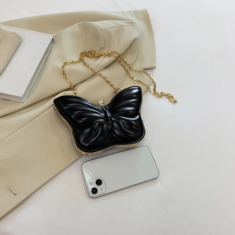 Women's PU leather crossbody bag with butterfly chain, black colour, sandwich pocket, 19.5cm width