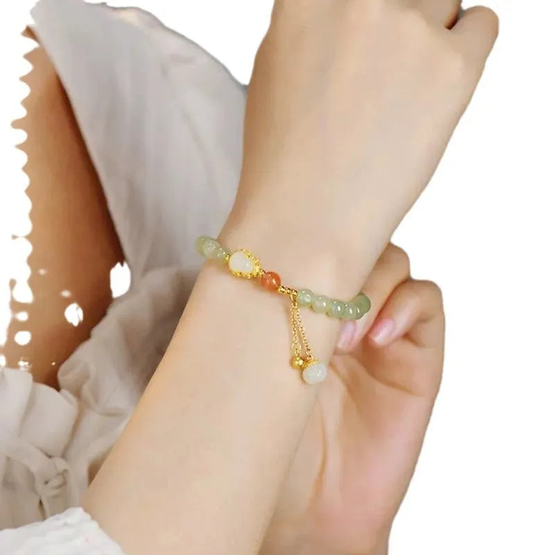 Qingshui jade women's bracelet with gold plated 6mm beads and Chinese fu character