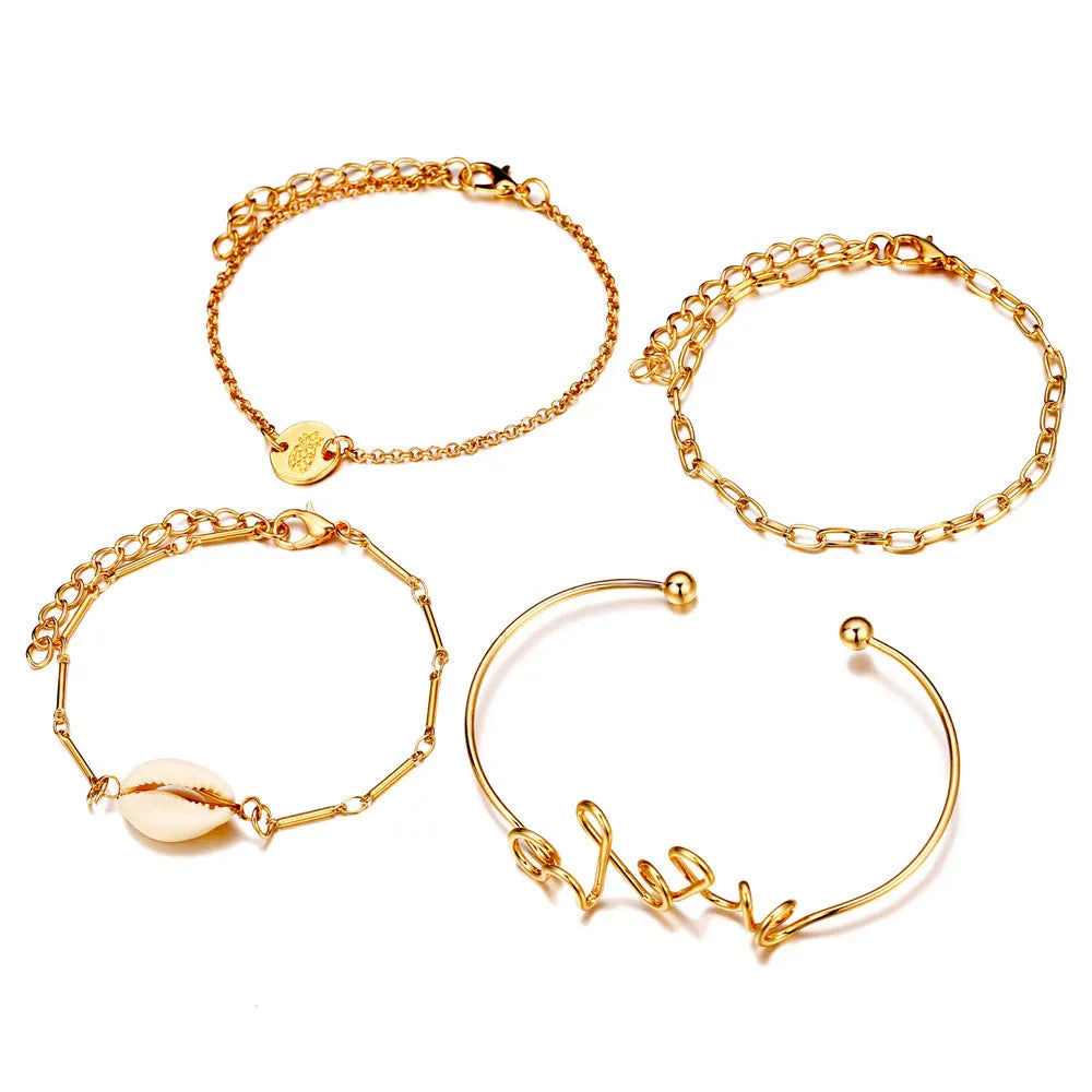 Set of four alloy bracelets in multicolour designs arranged in a gift box