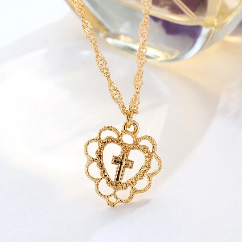 Gold multi-layer rhinestone and imitation pearl necklace on a white background
