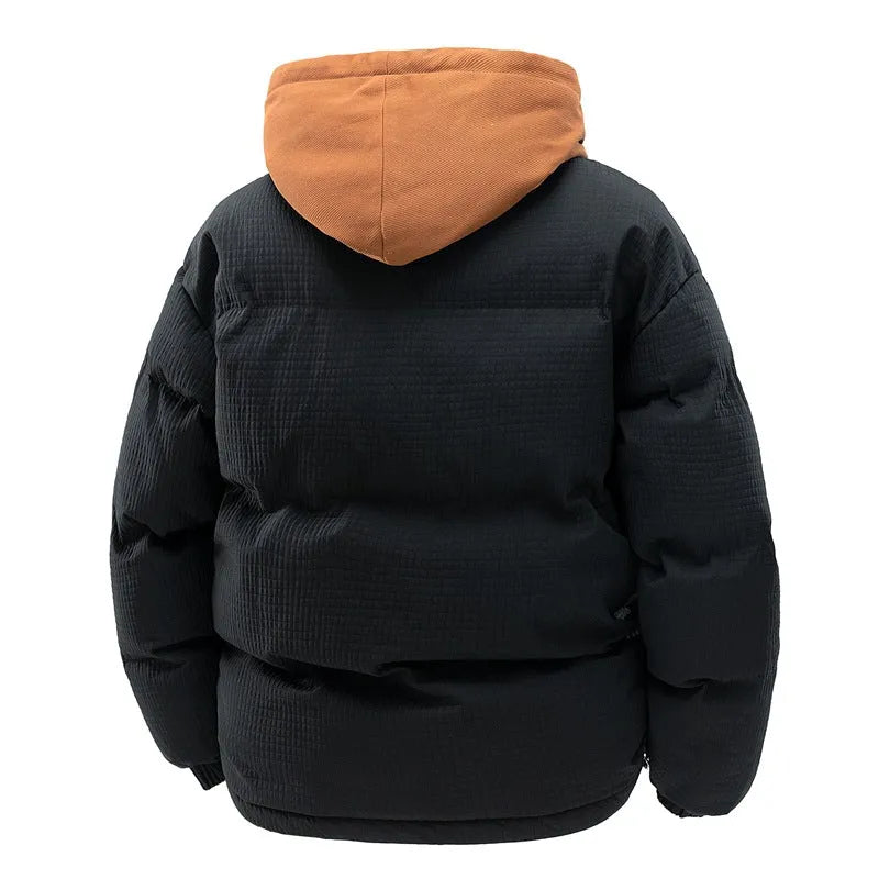 Men's loose casual hooded fake two-piece jacket in beige, side view, showing side pockets and straight hem