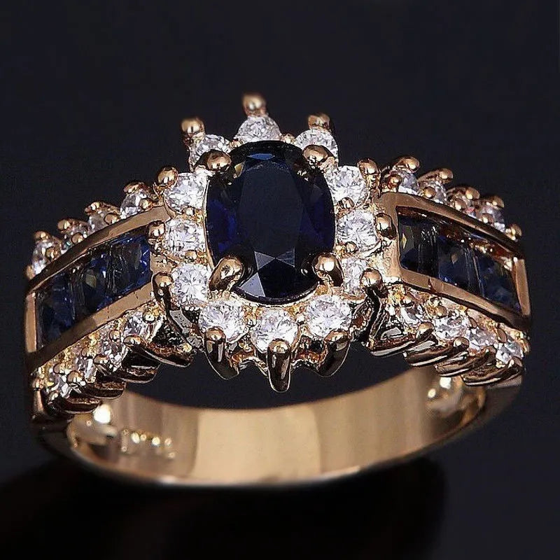 Personalised fashion rings with diamond treatments in blue and purple designs on zinc alloy