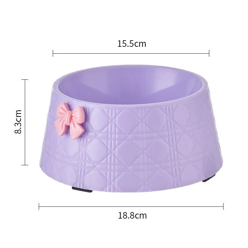 Ceramic pet bowl with diamond pattern and a bowknot decoration in pink, silver, black, purple, or white
