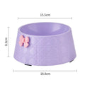 Ceramic pet bowl with diamond pattern and a bowknot decoration in pink, silver, black, purple, or white