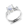S925 silver geometric ring with irregular triangle shape and moonstone on a model's hand.