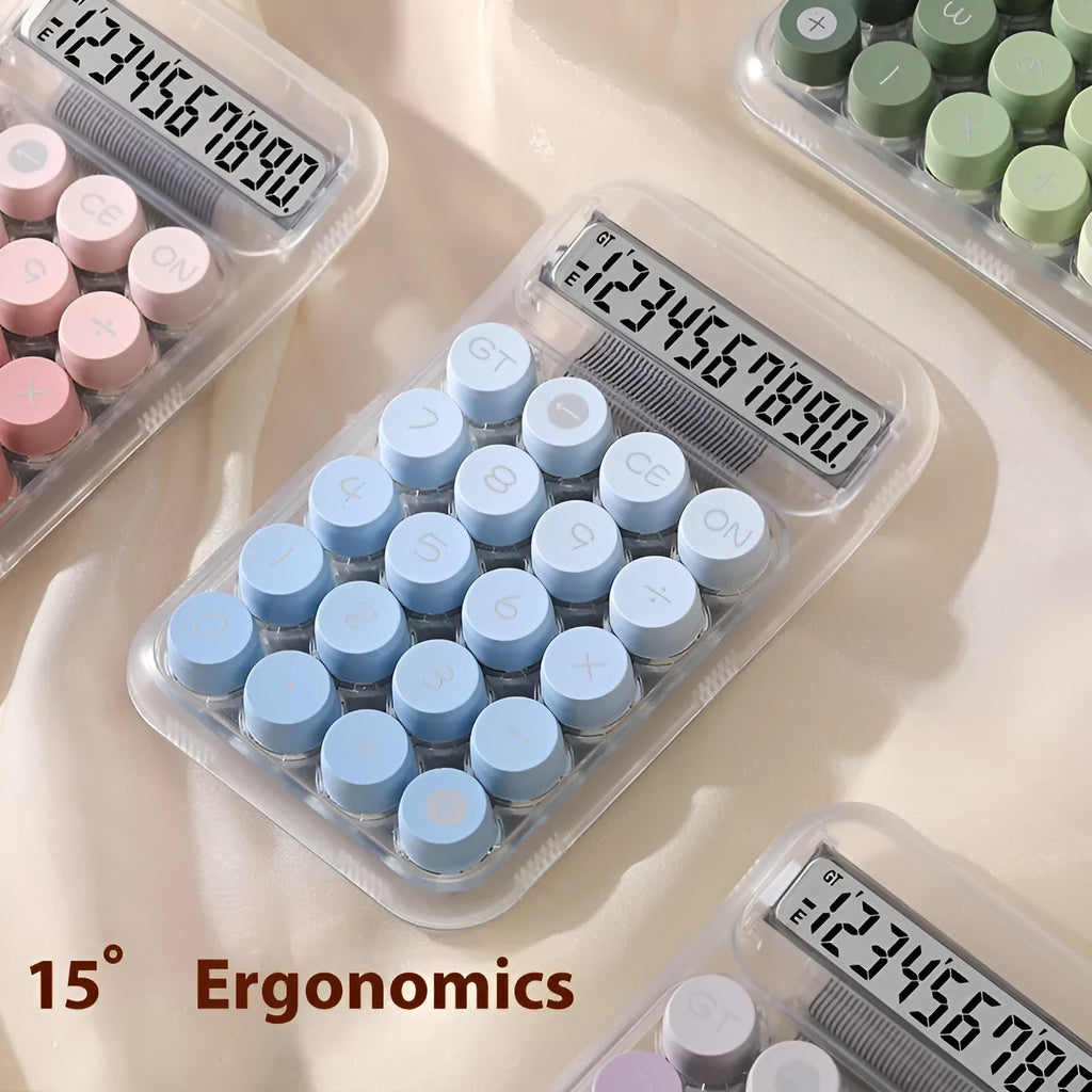 Round gradient colour mechanical keyboard calculator in mute blue, green, pink, or purple on a desk.