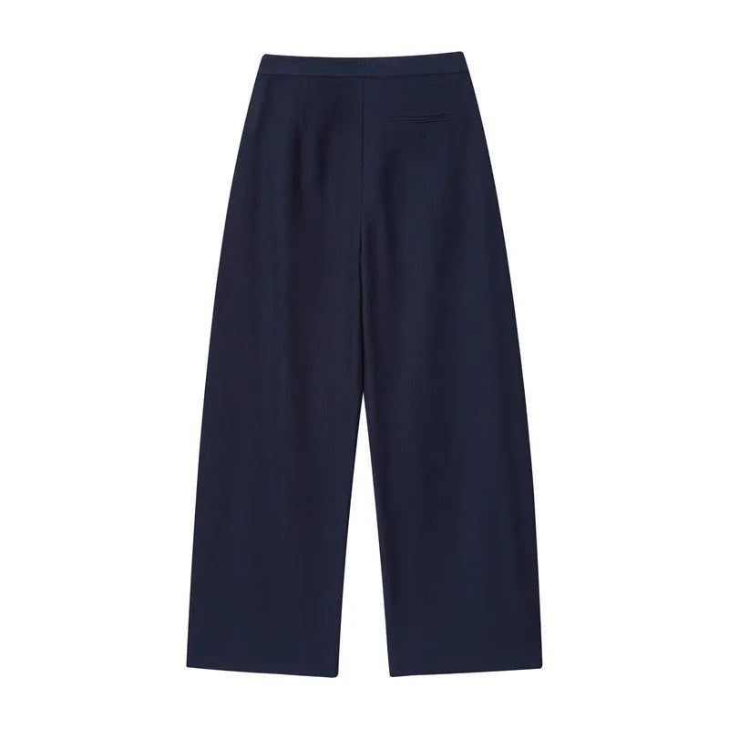 Women's linen blend wide-leg trouser and flounced sleeve top co-ord suit set in a professional style.