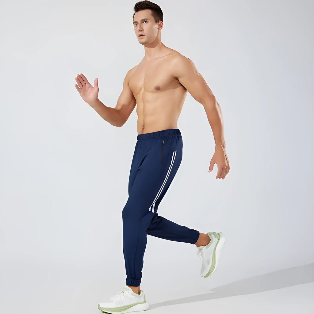 Men's black polyester running trousers with mid waist fit and full-length legs