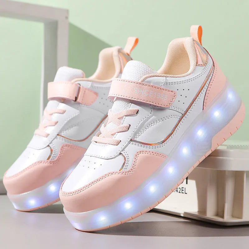 Children's light up roller skates in pink, showing LED illuminated wheels and adjustable sizing.