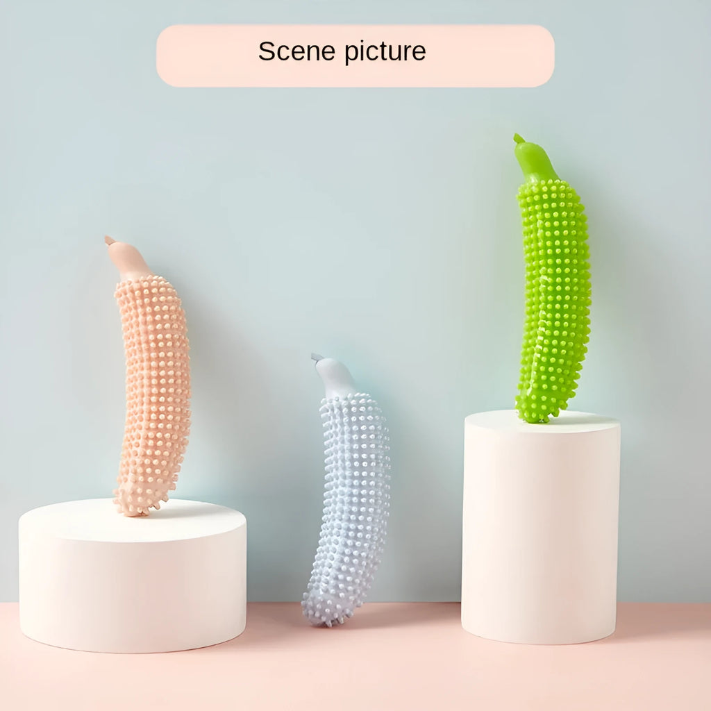 Green silicone dog chew toy shaped like a cucumber, 24cm long, for large breed teething and training.